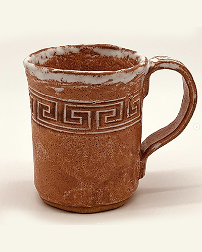 Pottery: Hand molded cup by artist Rachel Dolezal